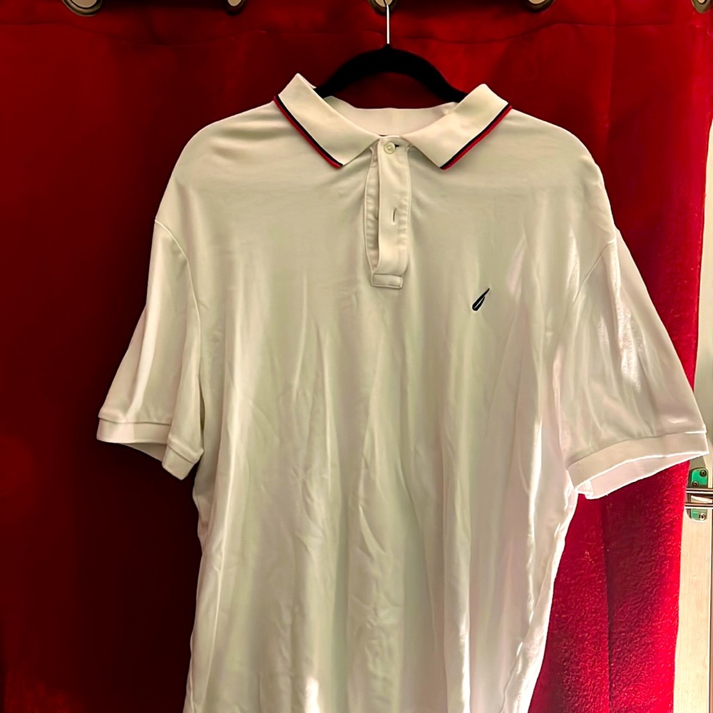 All white with red and blue collar Nautica extra large man